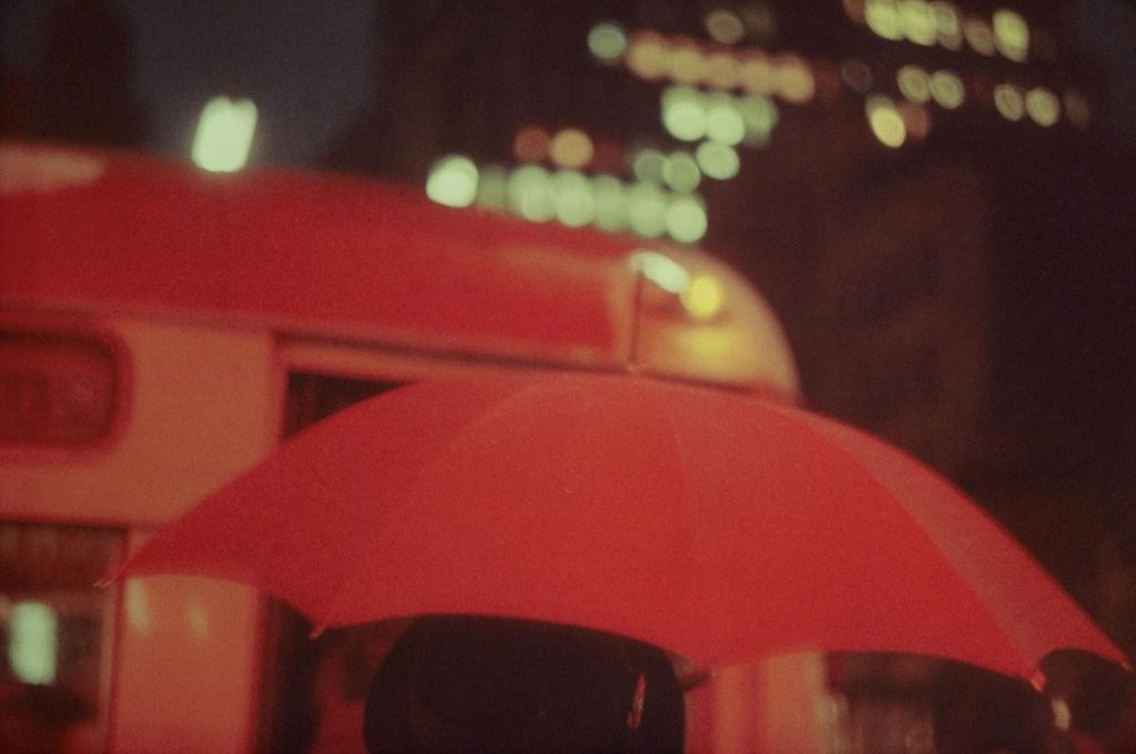 saul leiter red umbrella
